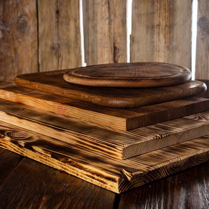Variety of wooden boards in kitchen
